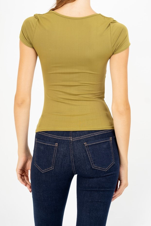 Maglia Charm Detail con accessorio.