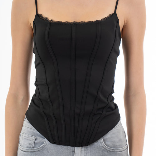 modella indossando Top effetto bustier in maglina elasticizzata con cuciture a vista e passamaneria colore Nero Unica