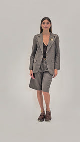 Giacca London Check con spilla.