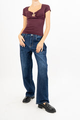 Maglia Charm Detail con accessorio.