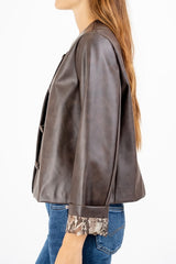 Giacca ecopelle morbida con fodera animalier.