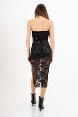 Abito lungo a fascia con paillettes e trasparenze