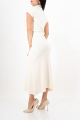 modella indossando Completo in maglia fine con dolcevita e gonna longuette in viscosa colore