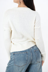 modella indossando Maglione morbido con motivo fiocco e vestibilità comoda colore