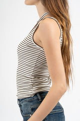 Top donna a costine elastiche con apertura asimmetrica sulla spalla.