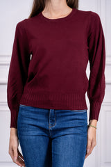 modella indossando Maglia Evania girocollo con maniche a palloncino colore