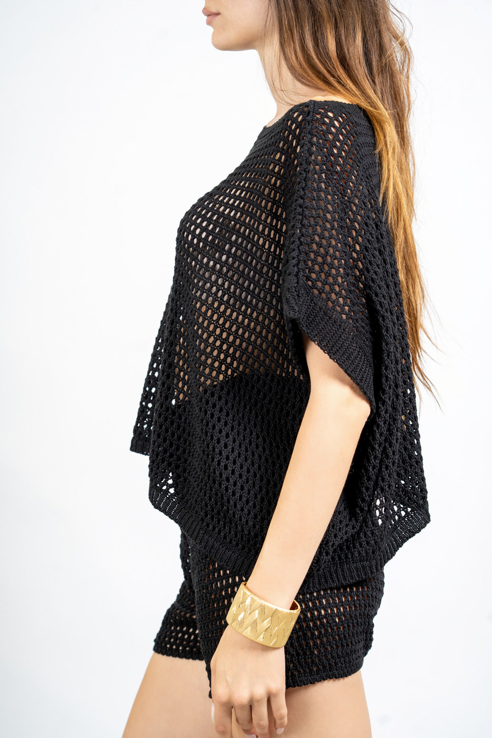 Completo rete crochet con shorts.