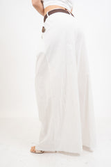 Pantalone wide leg in cotone elasticizzato con cintura intrecciata.