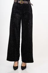 modella indossando Pantalone velluto con punti luce laminati colore