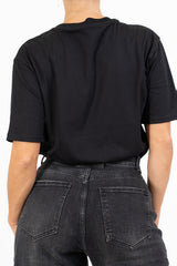T-shirt in cotone con ricamo “di mattina non parlatemi”