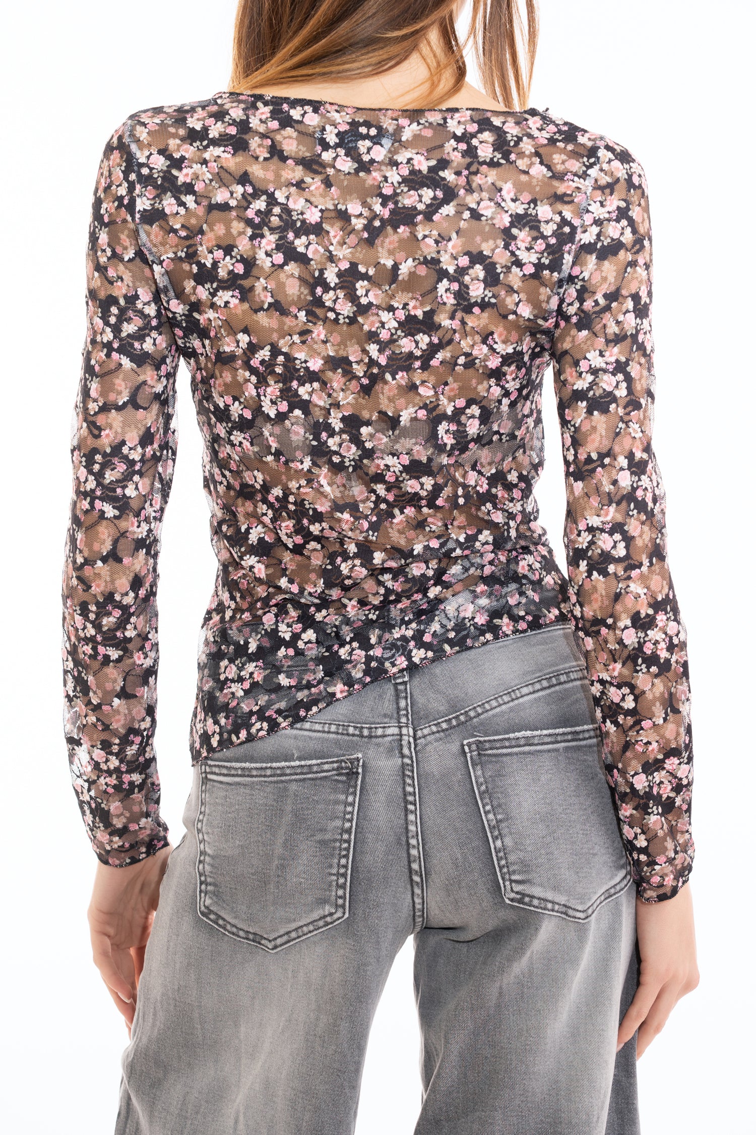 modella indossando Maglia in pizzo elasticizzato trasparente a fiori manica lunga colore