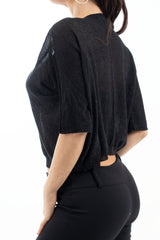 modella indossando Maglia ampia in viscosa con lurex e fondo elasticizzato colore