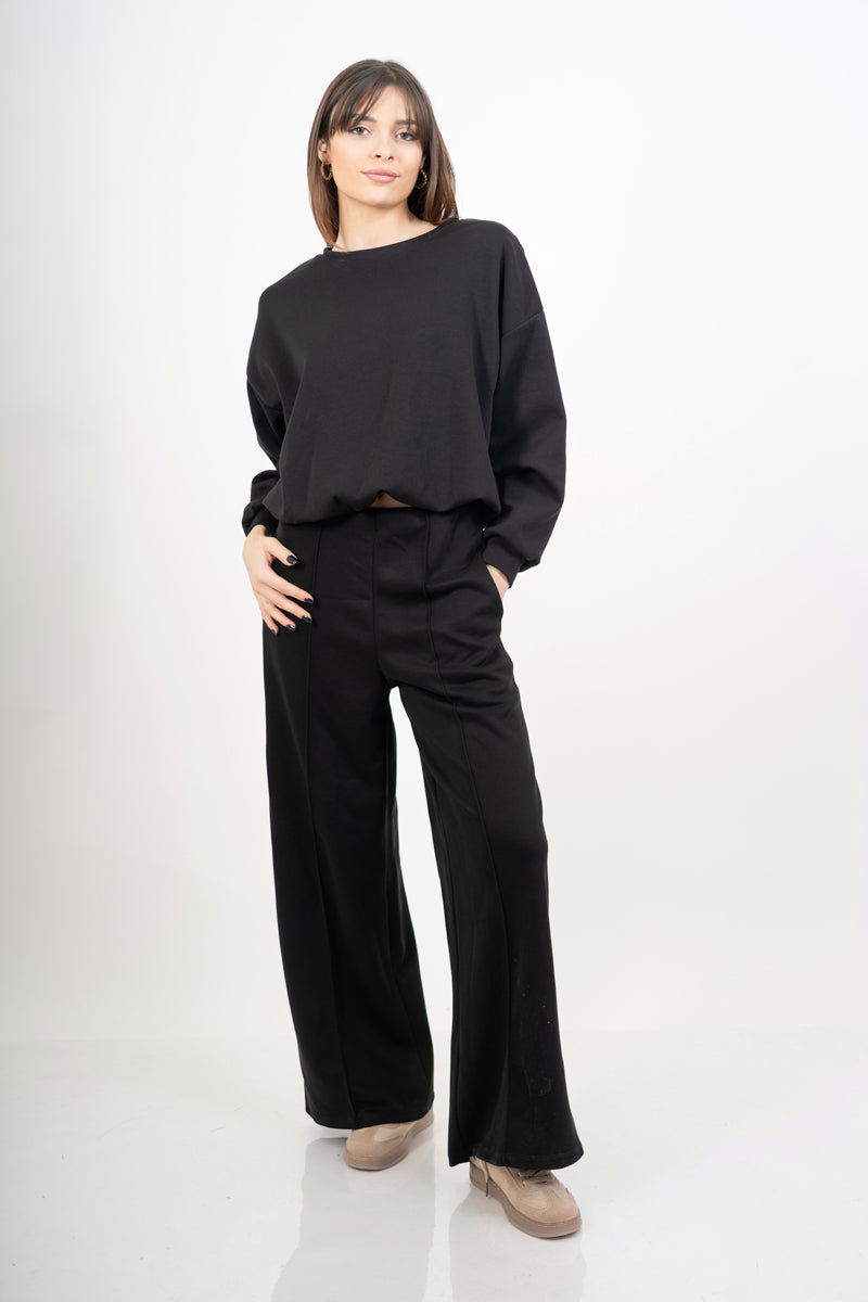 modella indossando Maglia felpa over con spalla scesa ed effetto palloncino colore