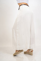Pantalone balloon cropped in misto lino con cintura intrecciata.