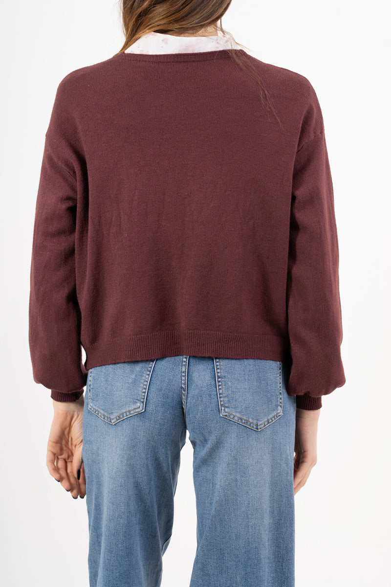 modella indossando Cardigan ampio con scollo a V e maniche a palloncino colore