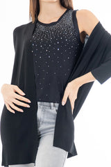 modella indossando Top canotta in microcostina di viscosa elasticizzata con strass degradé colore Nero Unica