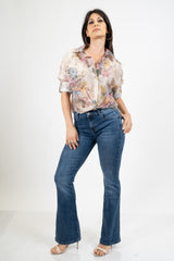 Camicia donna in tencel leggero con manica risvoltata e laccetto.