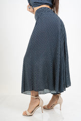Pantagonna ampia in viscosa a pois con vita alta e retro elasticizzato.