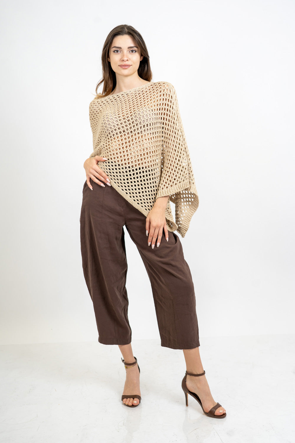 Poncho rete lurex in cotone effetto crochet.