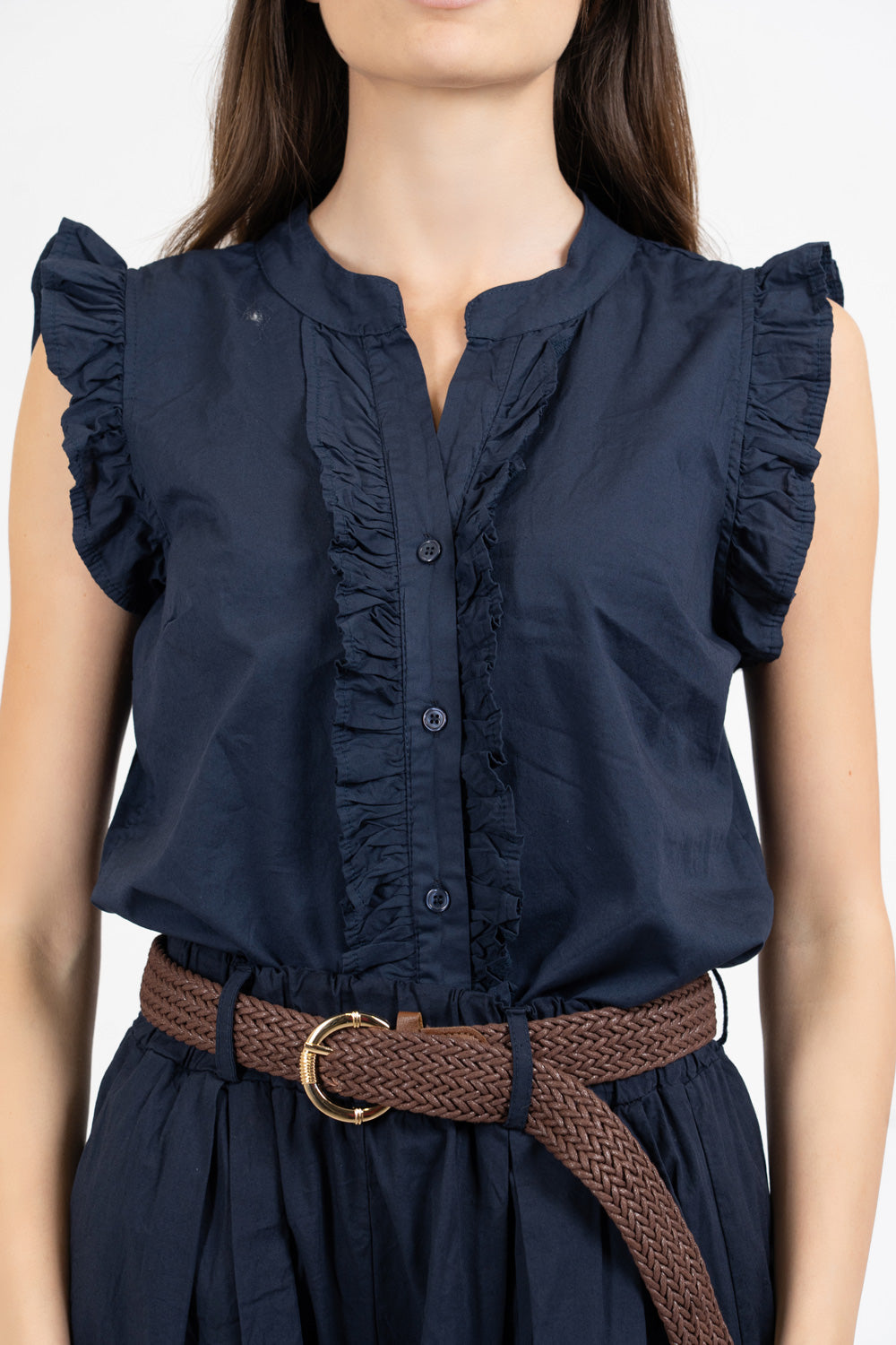 Camicia smanicata con rouge in cotone elasticizzato.