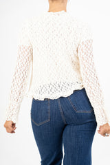 Cardigan goffrato con fiocco e maniche svasate