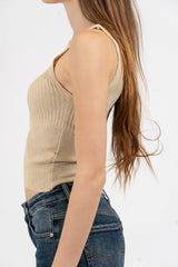 Top scollo V in maglia lurex a costine.