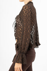 Cardigan goffrato con fiocco e maniche svasate