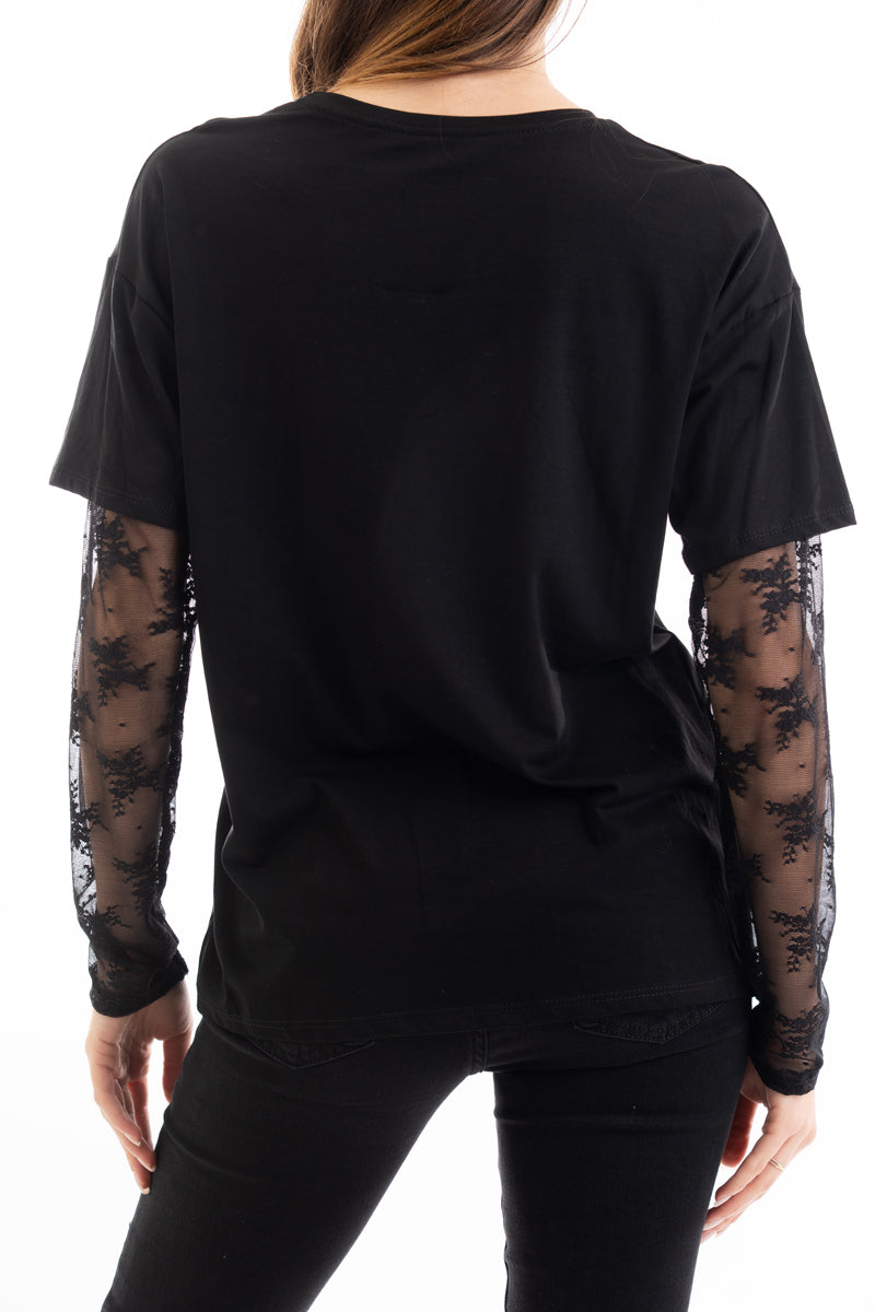 modella indossando Maglia over in cotone elasticizzato con manica lunga in pizzo colore