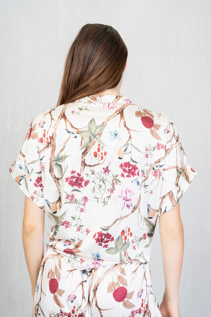 Camicia “Jungle Bloom” in raso fantasia botanica