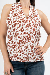 Top floreale in viscosa con scollo all’americana e apertura a goccia sul retro.