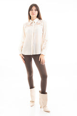 modella indossando Leggings cavallerizza a vita alta in maglina elasticizzata Tortora colore