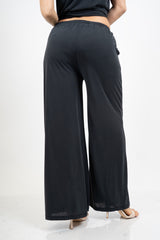 Pantalone palazzo in viscosa elasticizzata con coulisse Made in Italy.
