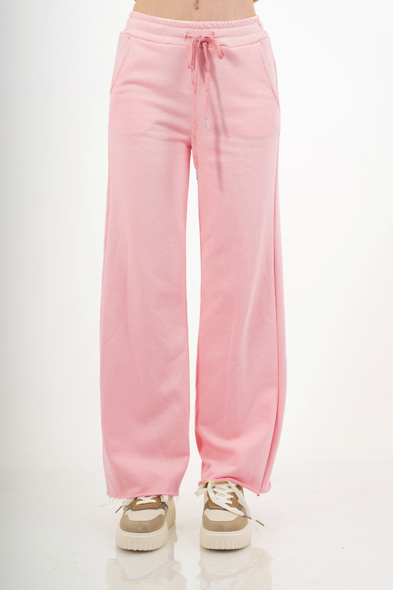 modella indossando Pantalone palazzo in felpa elasticizzata con coulisse colore Rosa Unica