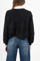 modella indossando Cardigan ampio con scollo a V e maniche a palloncino colore