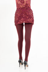 modella indossando Minigonna in microrete con paillettes e shorts interno colore