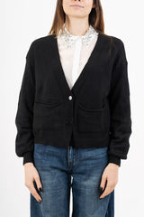 modella indossando Cardigan ampio con scollo a V e maniche a palloncino colore Nero Unica