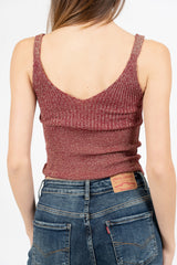 Top scollo V in maglia lurex a costine.
