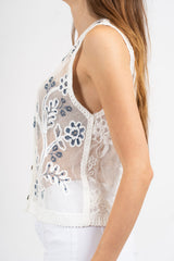 Gilet rete ricamata a fiori.
