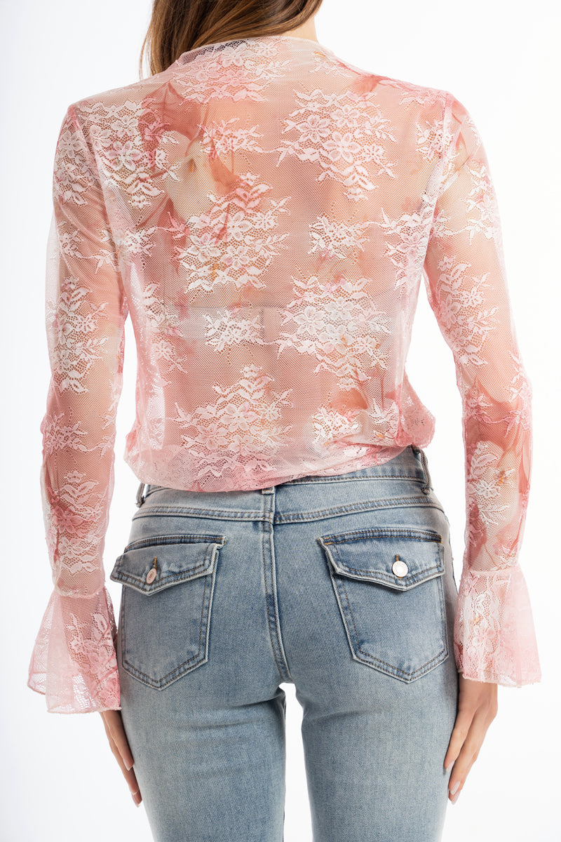 modella indossando Maglia in microrete elastica con stampa floreale effetto pizzo colore