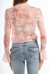 modella indossando Maglia in microrete elastica con stampa floreale effetto pizzo colore