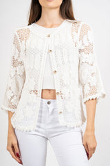 Giacchetto crochet a rete floreale.