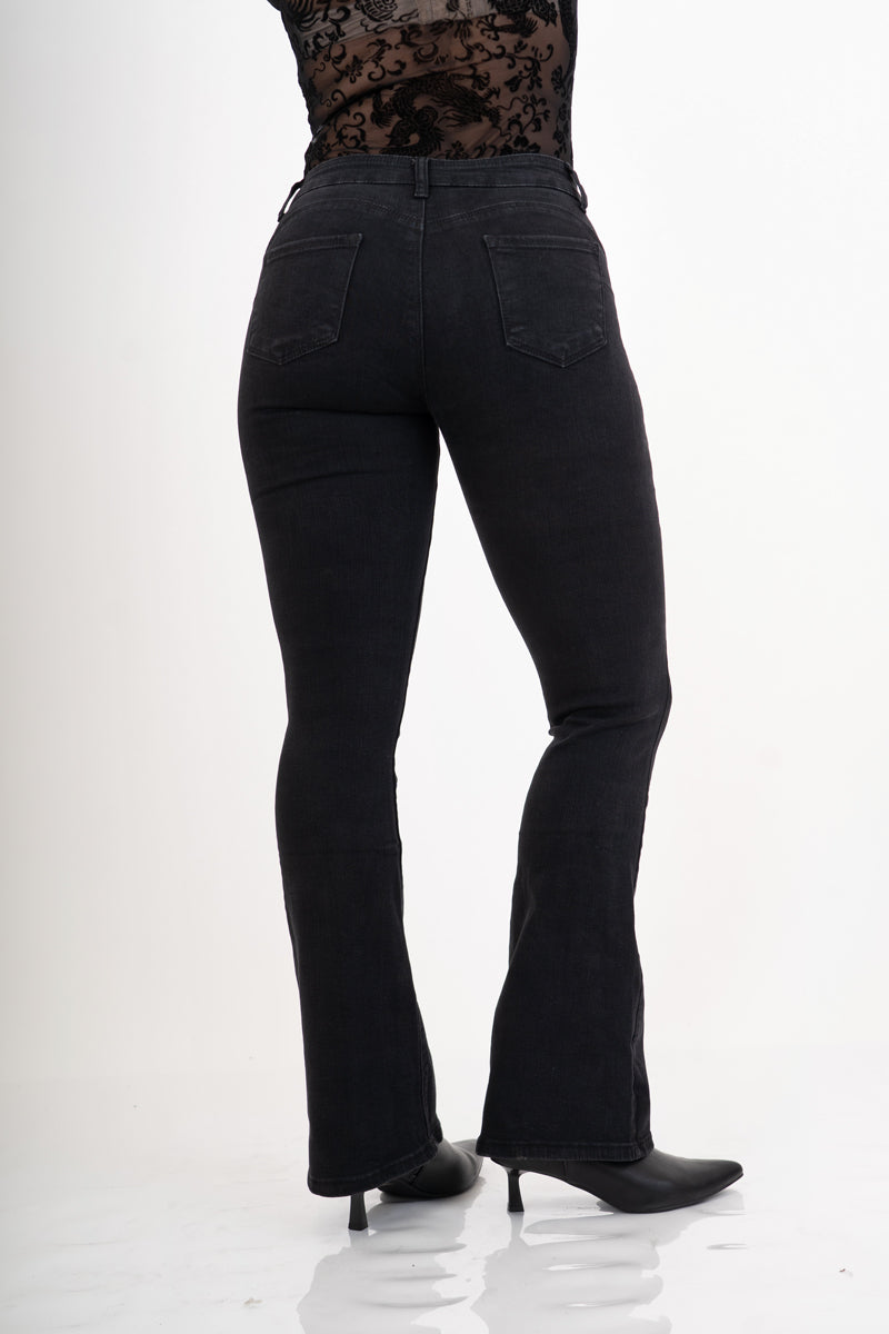 Jeans nero delavè push-up elasticizzato a zampa