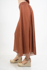 Pantagonna ampia in viscosa a pois con vita alta e retro elasticizzato.