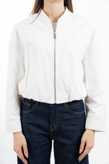 modella indossando Giacca bomber corta con zip metallica e fondo elastico colore Bianco Unica