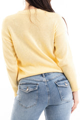 modella indossando Maglia over 100% cotone con scritta ricamata “No Vabbé” colore