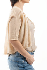 modella indossando Cardigan leggero in viscosa con lurex e manica 3/4 colore Oro Unica