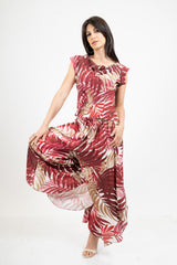 Blusa fantasia foglie in viscosa con manica corta e linea morbida.