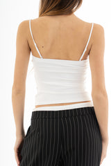 modella indossando Top effetto bustier in maglina elasticizzata con cuciture a vista e passamaneria colore