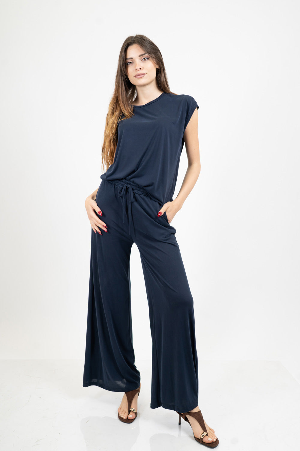 Pantalone palazzo in viscosa elasticizzata con coulisse Made in Italy.