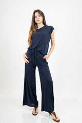 Pantalone palazzo in viscosa elasticizzata con coulisse Made in Italy.